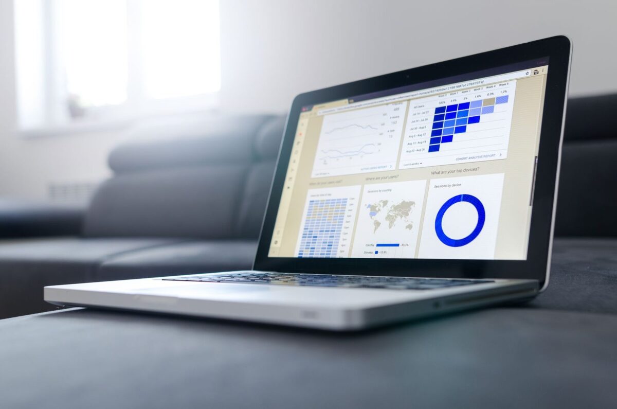 Laptop showing website analytics dashboards used to check a site's organic traffic